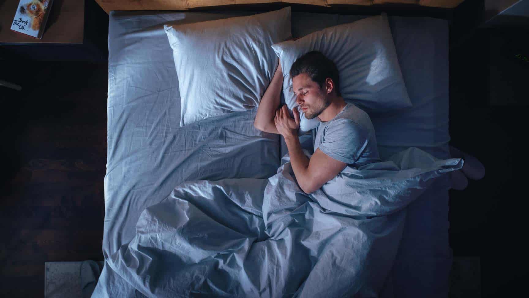 Person wearing a night guard while sleeping